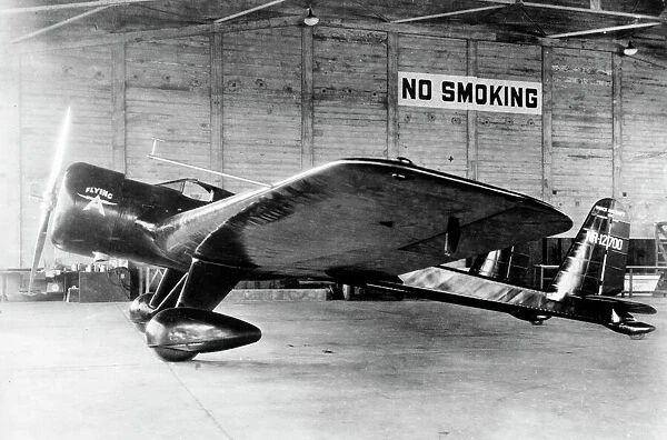Vance Mailplane (side view) in hangar of NR-12700
