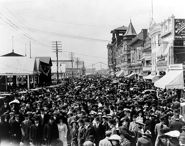 ATLANTIC CITY: BOARDWALK. A large crowd of people posing on the boardwalk in Atlantic City