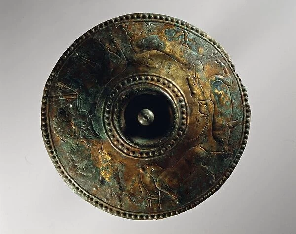 Bronze cover with embossed decorations representing animals, Etruscan civilization, 7th century b. c