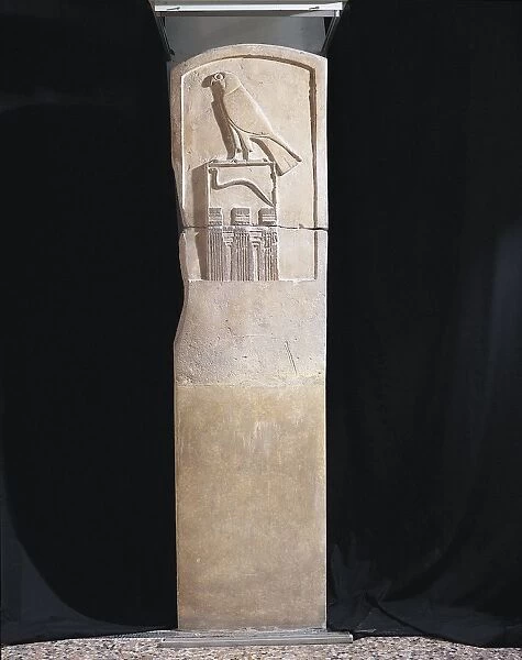 Limestone stele of the Serpent King, with bas-relief depicting falcon god Horus and a cobra from Abydos, Old Kingdom