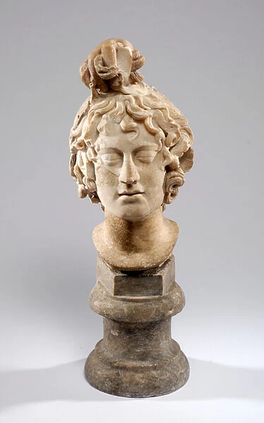 Head of Medusa being grasped by the fingers of Perseus, mounted on a modern neck