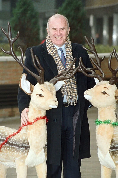 Clive James pictured at the BBC during Christmas time. 6th December 1990
