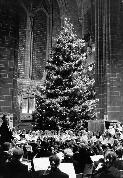 Robert Sells conducts the choir and orchestra at Liverpools Anglican Cathedral