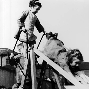 Children playing on slide