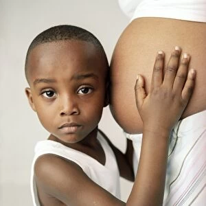 Pregnant woman and son