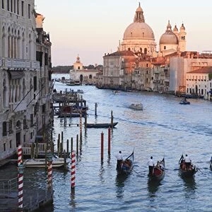 Gondolas on the Grand Canal, and view towards the domed church of Santa Maria Della Salute