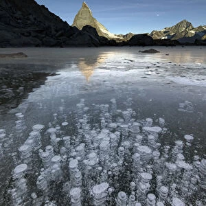 Icy bubbles in Lake Stellisee Zermatt Canton of Valais Pennine Alps Switzerland