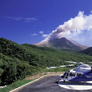 Caribbean, Montserrat, Soufriere Hills. Active volcano and island helicopter