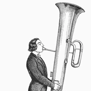OPHICLEIDE, 19th CENTURY. Keyed brass instrument, being played by Jean Prospere. Wood engraving, English, mid-late 19th century