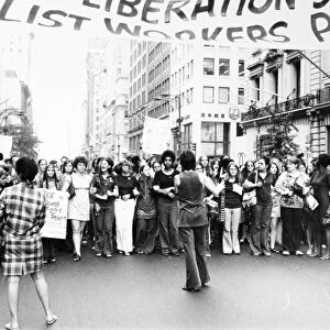 Women marching down New Yorks Fifth Avenue to a rally in support of the Womens Liberation Movement, 26 August 1970. On the extreme left, wearing a white hat, is Congresswoman Bella Abzug