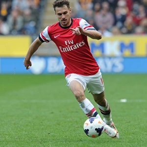 Aaron Ramsey in Action: Arsenal's Midfield Maestro Shines Against Hull City (2013-2014)