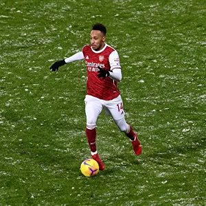 Arsenal's Aubameyang Scores the Difference: Arsenal Triumph Over West Bromwich Albion in Intense Premier League Clash (2020-21)