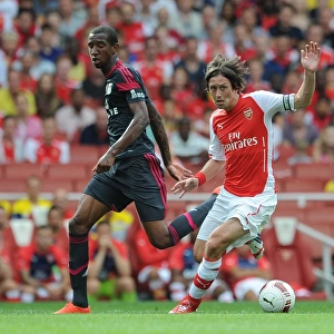 Tomas Rosicky (Arsenal) Anderson Talisca (Benfica). Arsenal 5: 1 Benfica. The Emirates Cup, Day 1