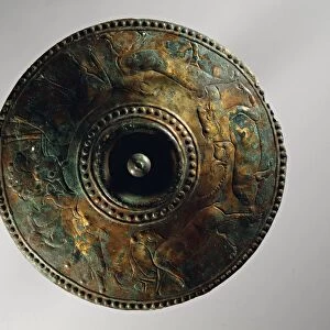Bronze cover with embossed decorations representing animals, Etruscan civilization, 7th century b. c