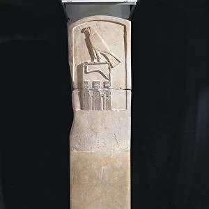 Limestone stele of the Serpent King, with bas-relief depicting falcon god Horus and a cobra from Abydos, Old Kingdom