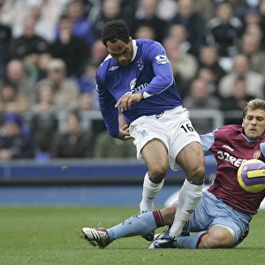 Everton v Aston Villa - Evertons Joleon Lescott and Aston Villas Stilian Petrov