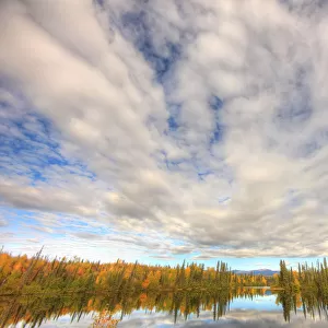 Sky Reflected In Dragon Lake Along The North Canol Road, Yukon