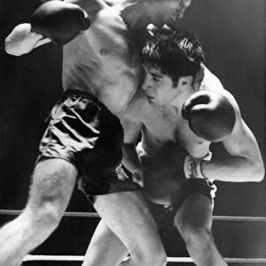 Bobby Ros and Willie Toweel in action during their Lightweight match at King