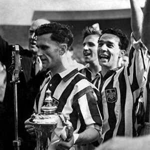 Millard, The West Bromwich Captain Holding Cup after presentation